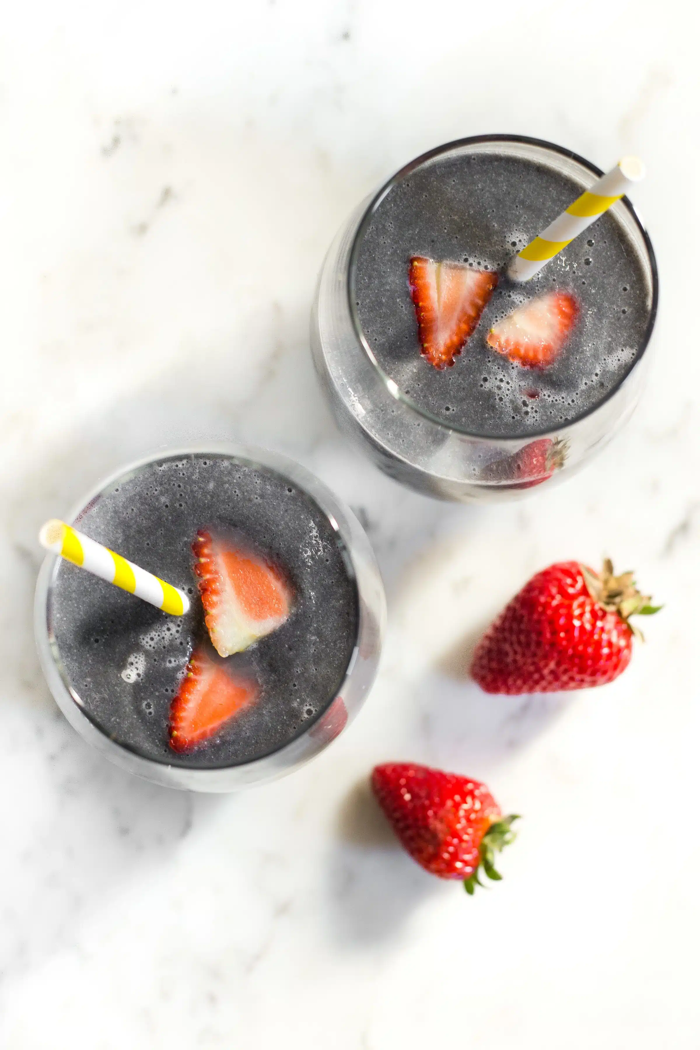 image of two glasses of activated charcoal smoothie