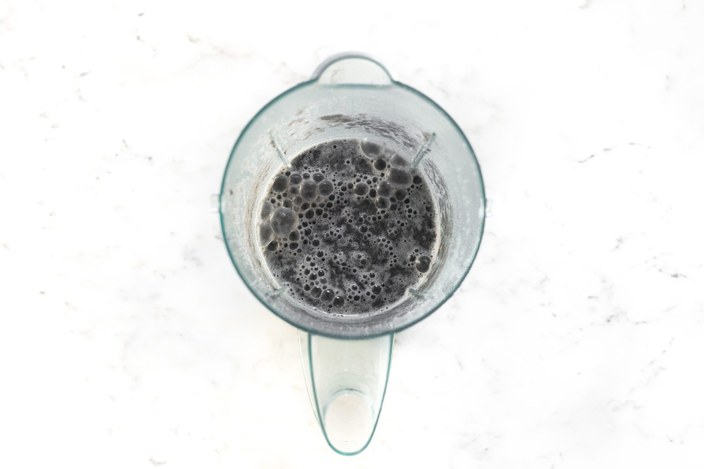 image of blended activated charcoal smoothie