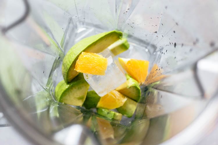 image of avocado ice and orange in blender