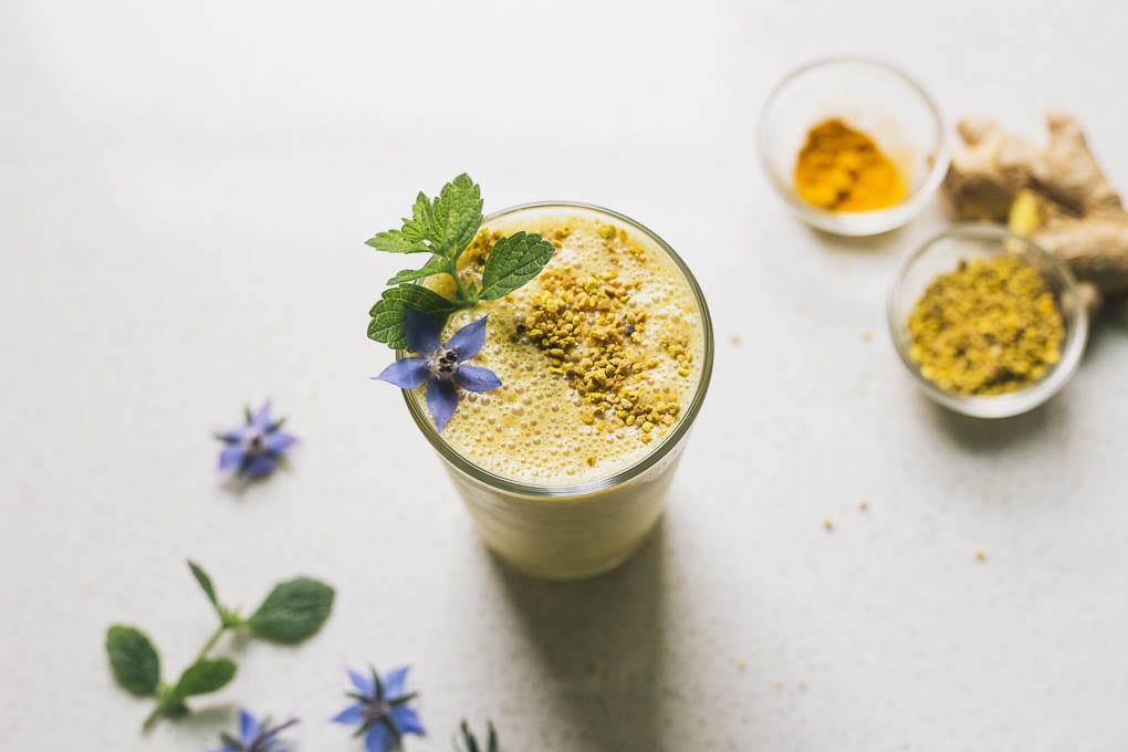 image of anti-inflammatory peach ginger turmeric smoothie in a glass