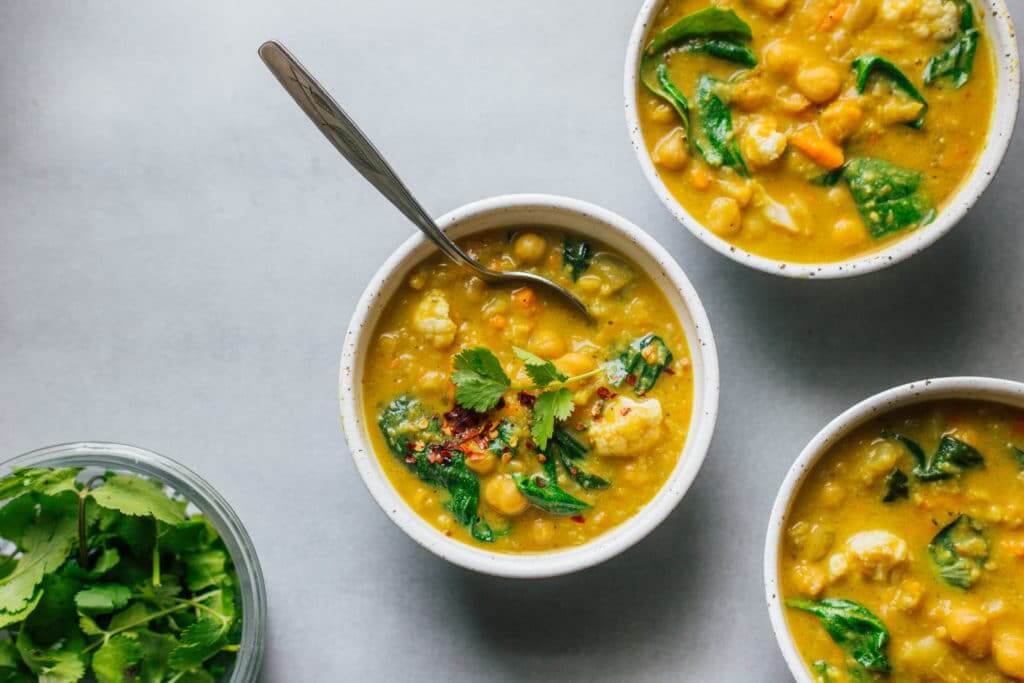 This veggie-based chickpea dhal will warm you up on a cold day. Plus, the spices, like turmeric and ginger, will help with digestion and absorption of nutrients.