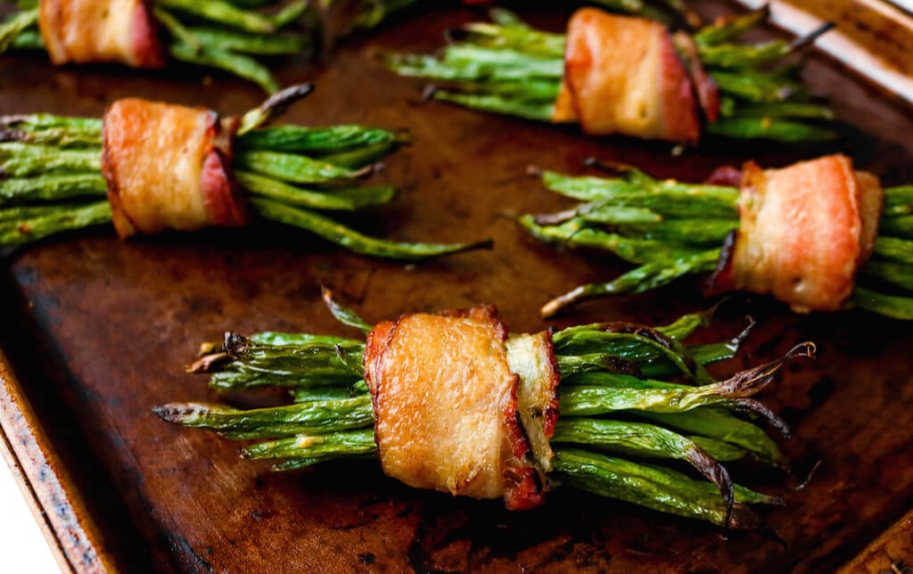 The smoky bacon bundles are the perfect appetizer or side dish with pre-portioned servings filled with roasted green beans and garlic.