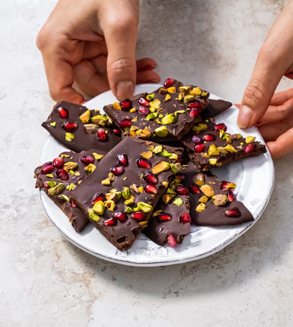 Antioxidant-rich cacao, immune-boosting ginger, and hormone-balancing pomegranate seeds come together in this delectable chocolate bark for a treat you can feel good about.